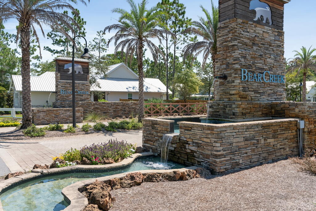 100 Grizzly Street Freeport, FL 32439 - Photo 57 of 65 front view of a house with a yard