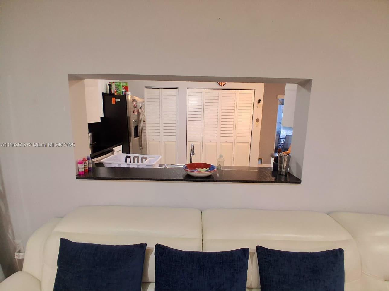 10830 Northwest 8th Street Pembroke Pines, FL 33026 - Photo 15 of 69 a bathroom with a sink and a mirror