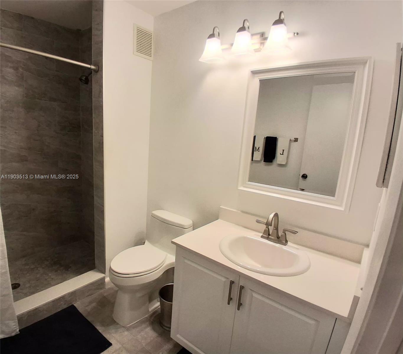 10830 Northwest 8th Street Pembroke Pines, FL 33026 - Photo 24 of 69 a bathroom with a sink toilet and shower