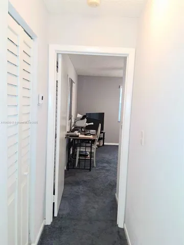 a room with pool and wooden floor