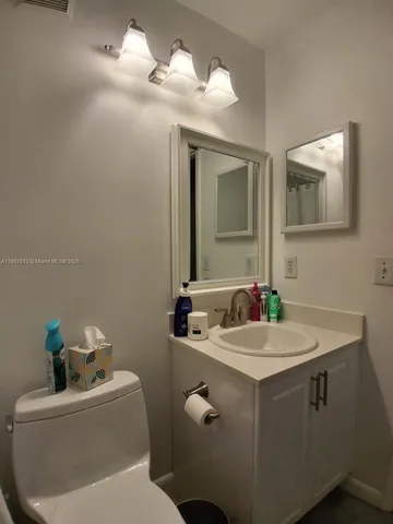 a bathroom with a shower and a toilet