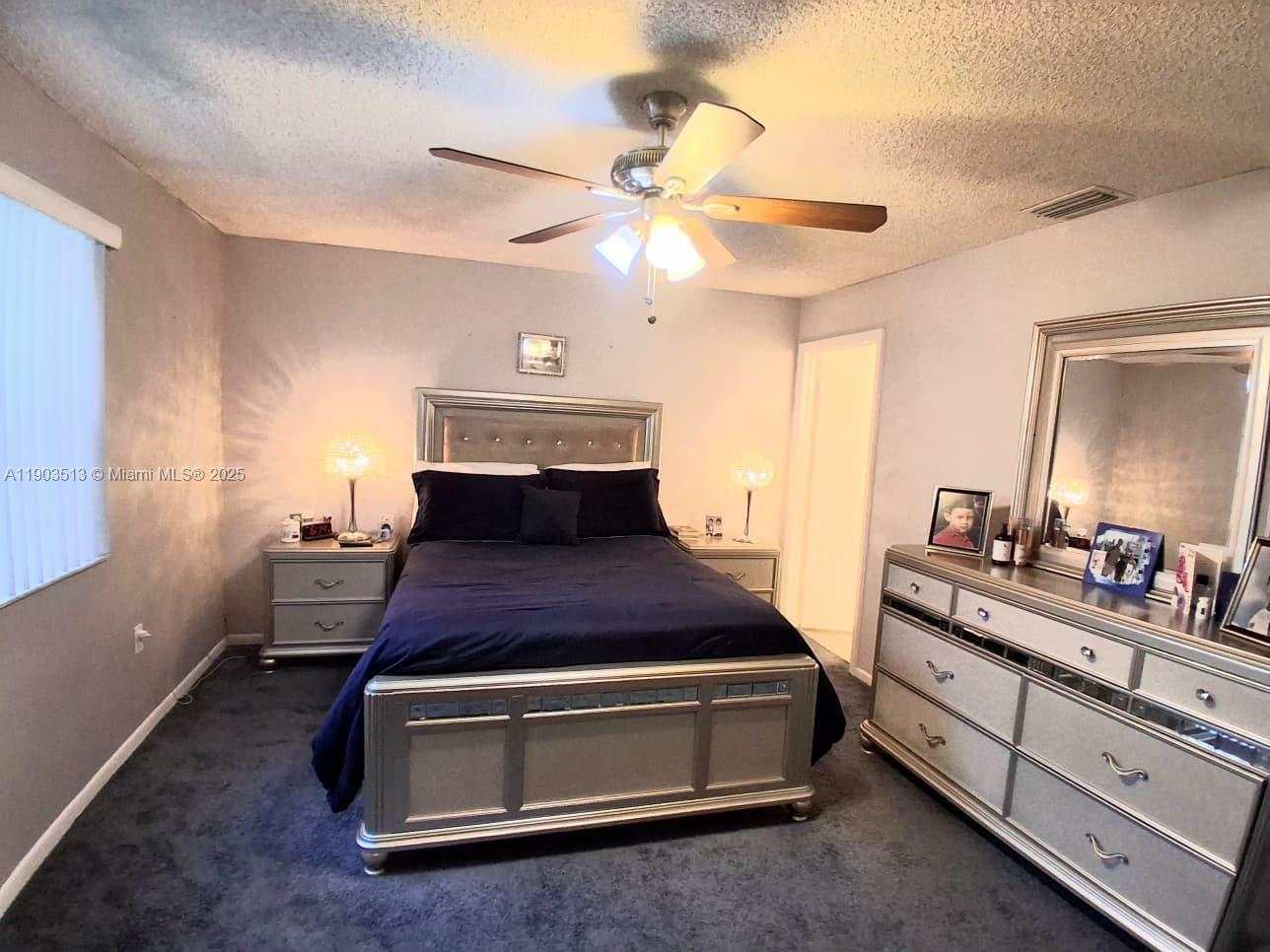 10830 Northwest 8th Street Pembroke Pines, FL 33026 - Photo 35 of 69 a room with pool and wooden floor