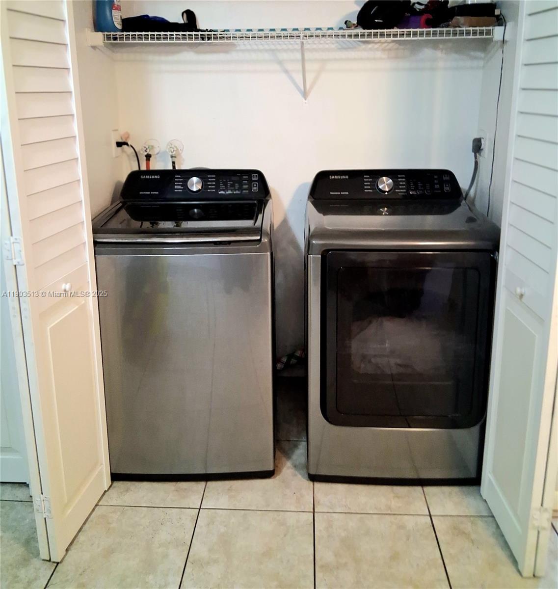 10830 Northwest 8th Street Pembroke Pines, FL 33026 - Photo 61 of 69 a stove top oven sitting inside of a kitchen