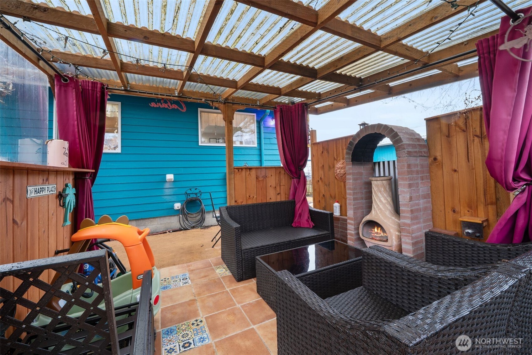 0 Jennings Street Sedro-Woolley, WA 98284 - Photo 20 of 40 a backyard of a house with barbeque oven and outdoor seating