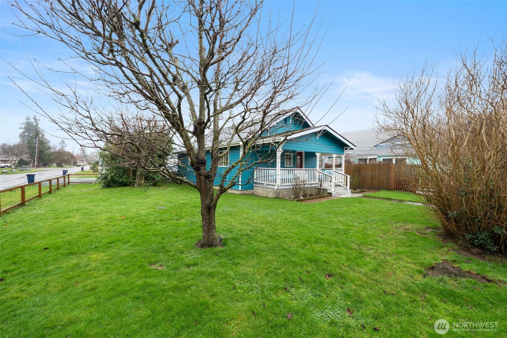 0 Jennings Street Sedro-Woolley, WA 98284 - Photo 23 of 40 a view of a house with backyard and a tree