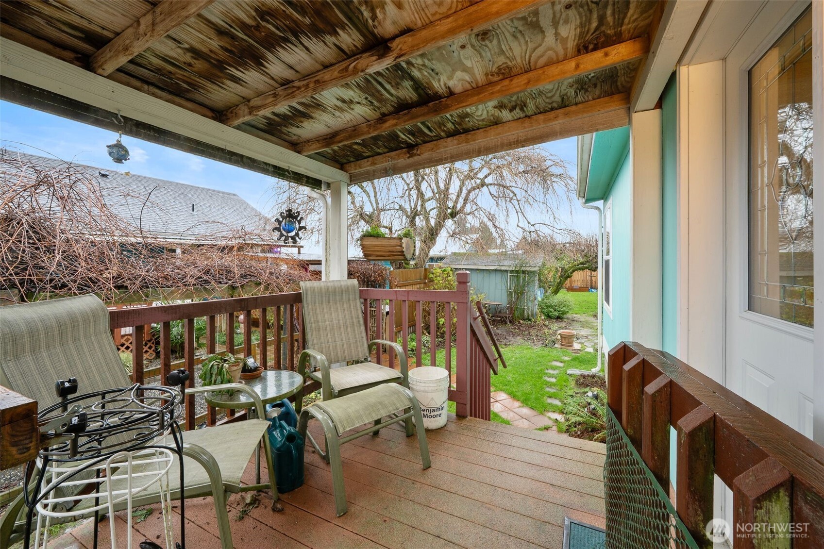 0 Jennings Street Sedro-Woolley, WA 98284 - Photo 35 of 40 a view of a chairs and table in patio with wooden floor