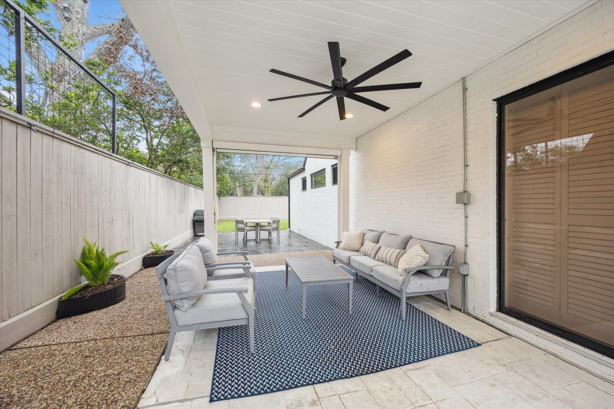 6348 Vanderbilt Street West University Place, TX 77005 - Photo 29 of 30 Covered patio area next to pool and green space