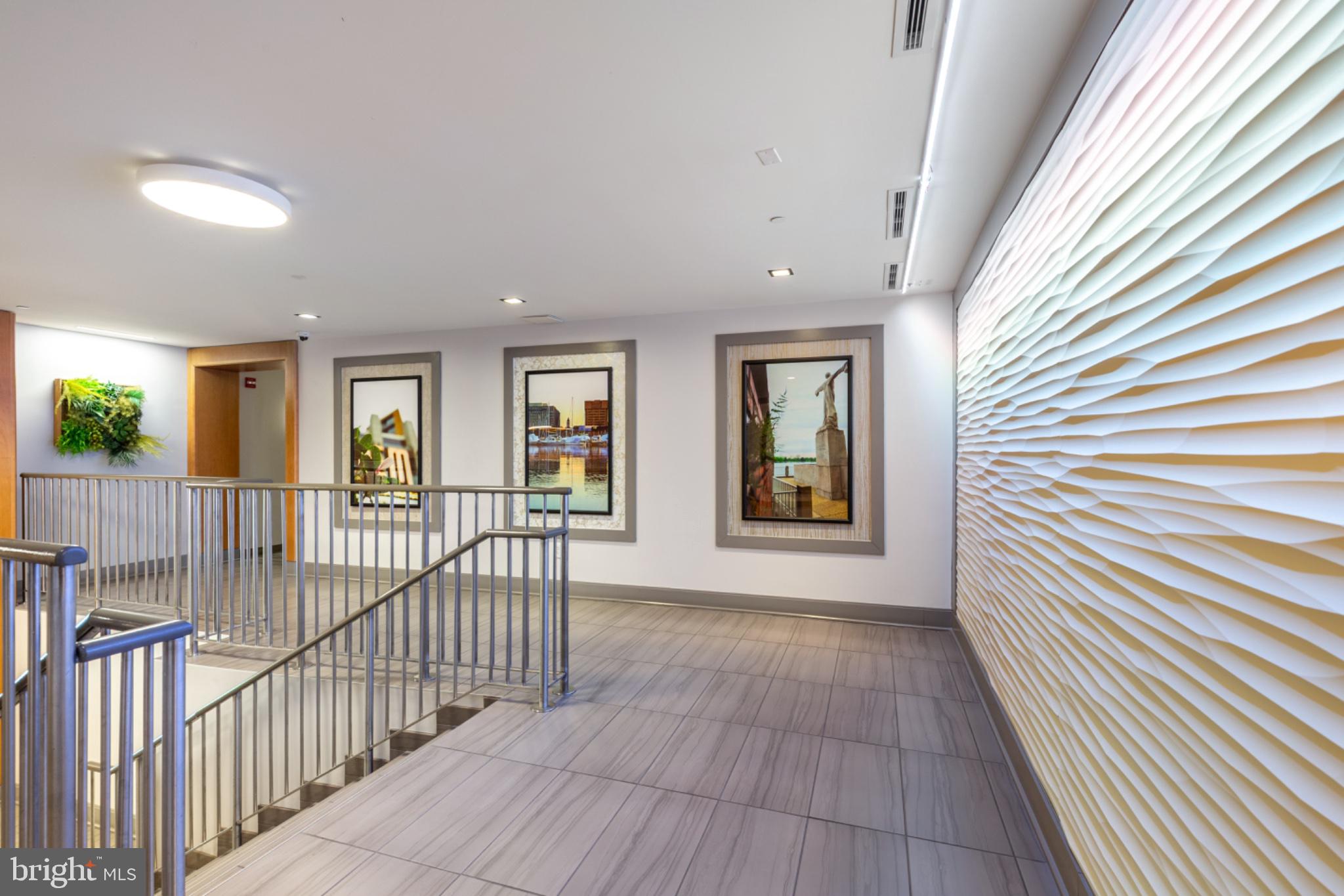 350 G Street Southwest, Unit N423 Washington, DC 20024 - Photo 5 of 43 Artful entrance with modern design.