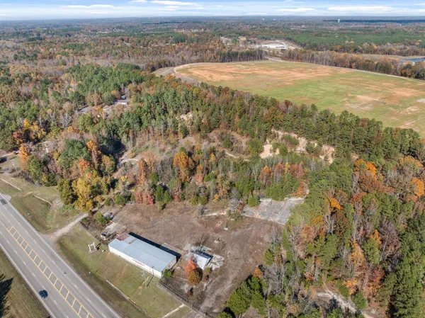 an aerial view of beach and yard
