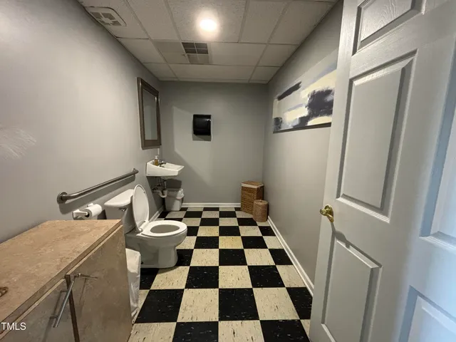 a black and white checkered floor with a black white checkered floor