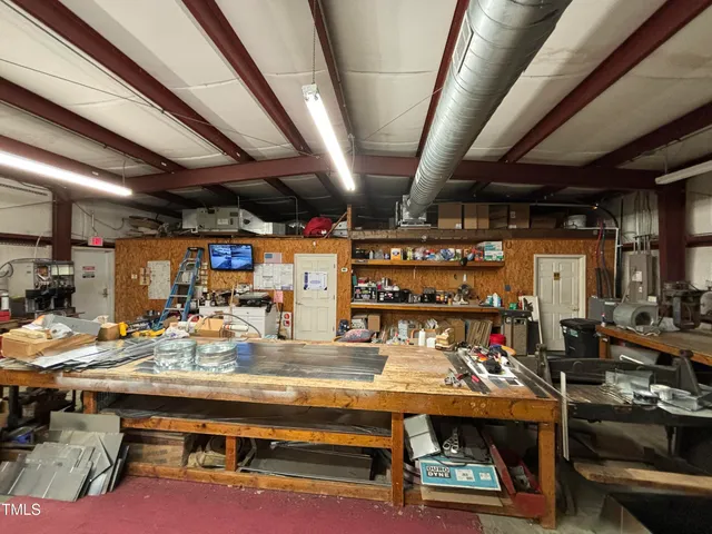 a room with lots of wooden furniture