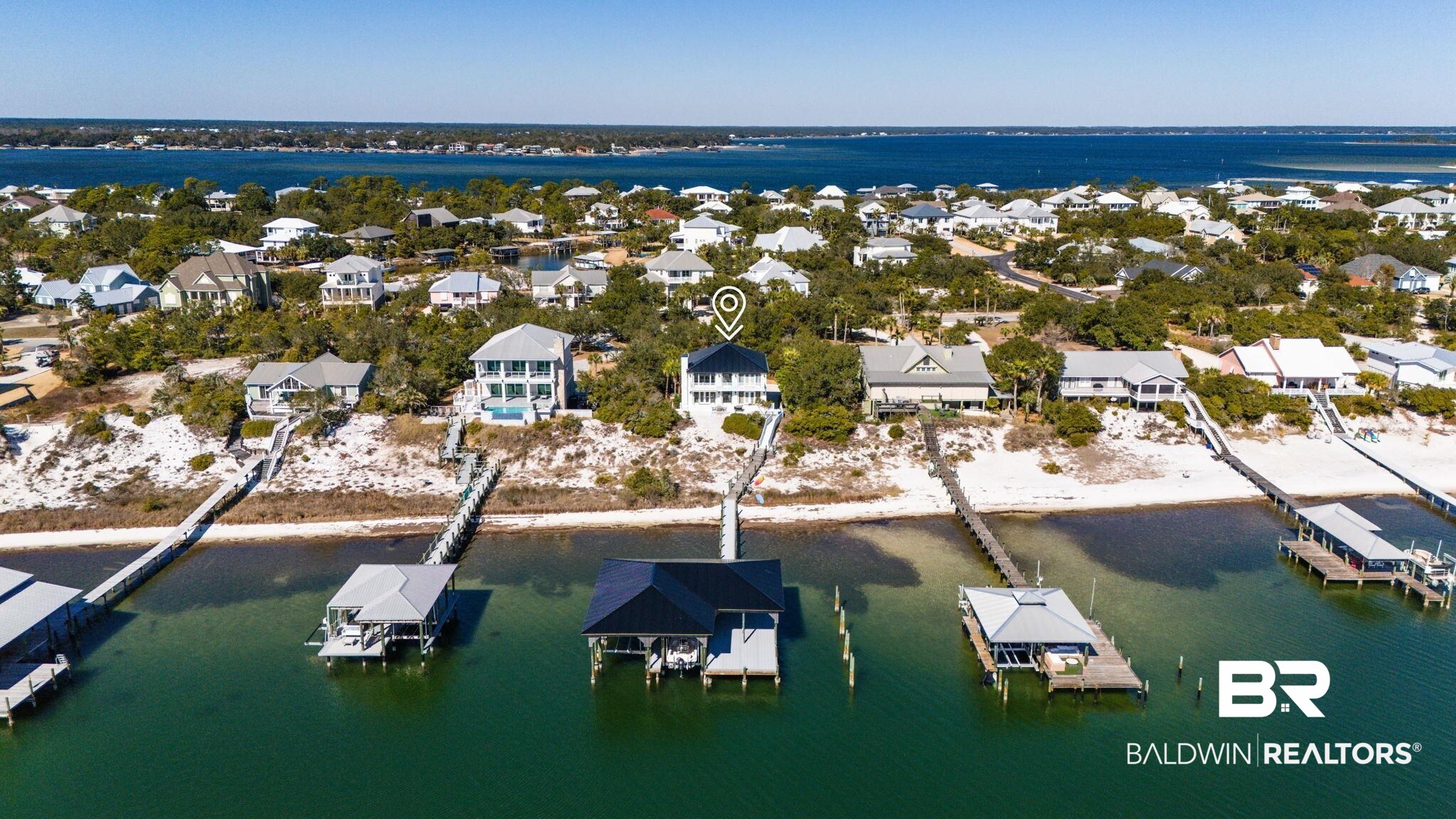 30194 River Road Orange Beach, AL 36561 - Photo 37 of 45 Aerial view of residential area with a nearby body of water