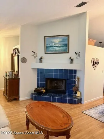 a spacious bathroom with a sink and a mirror