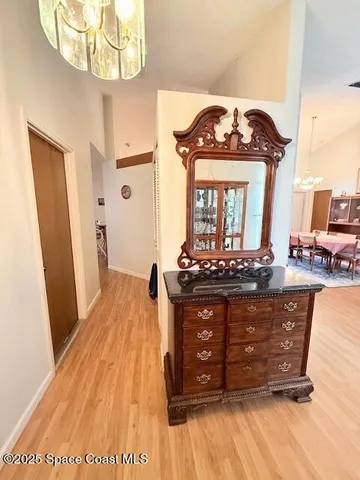 a bathroom with a double vanity sink mirror and toilet