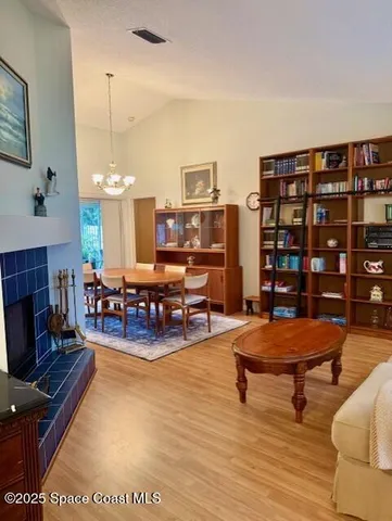 a spacious bathroom with a sink and a mirror