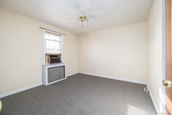a view of kitchen and utility area