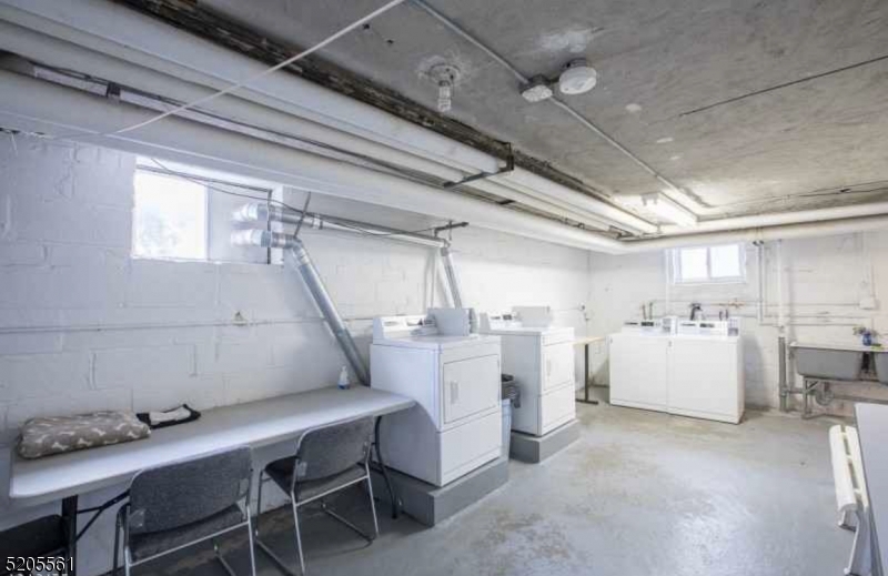 495 Main Street, Unit B 2 Chatham, NJ 07928 - Photo 12 of 22 a room with storage and utility