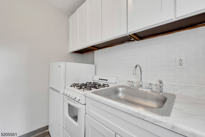 495 Main Street, Unit B 2 Chatham, NJ 07928 - Photo 2 of 22 a close view of sink and tap