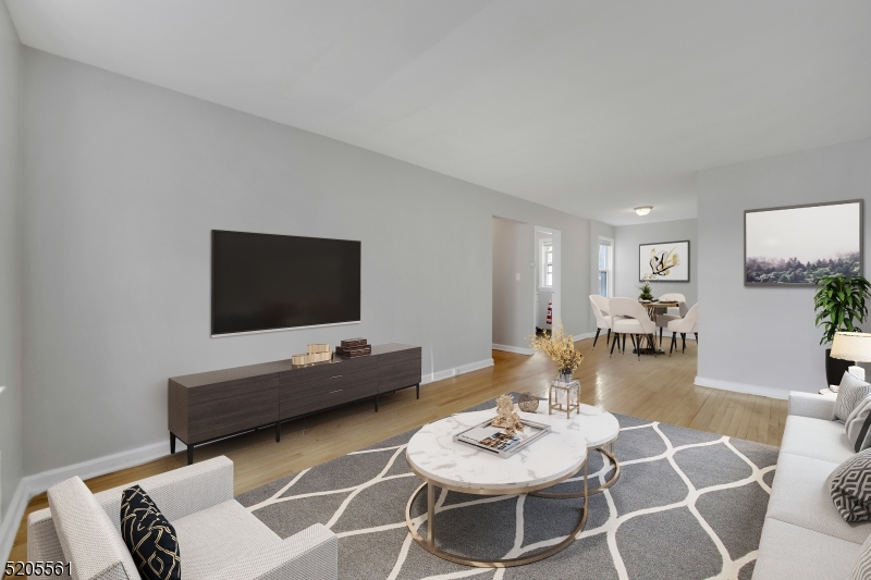 495 Main Street, Unit B 2 Chatham, NJ 07928 - Photo 22 of 22 a living room with furniture and a flat screen tv