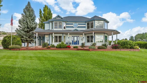 a view of a house with a swimming pool