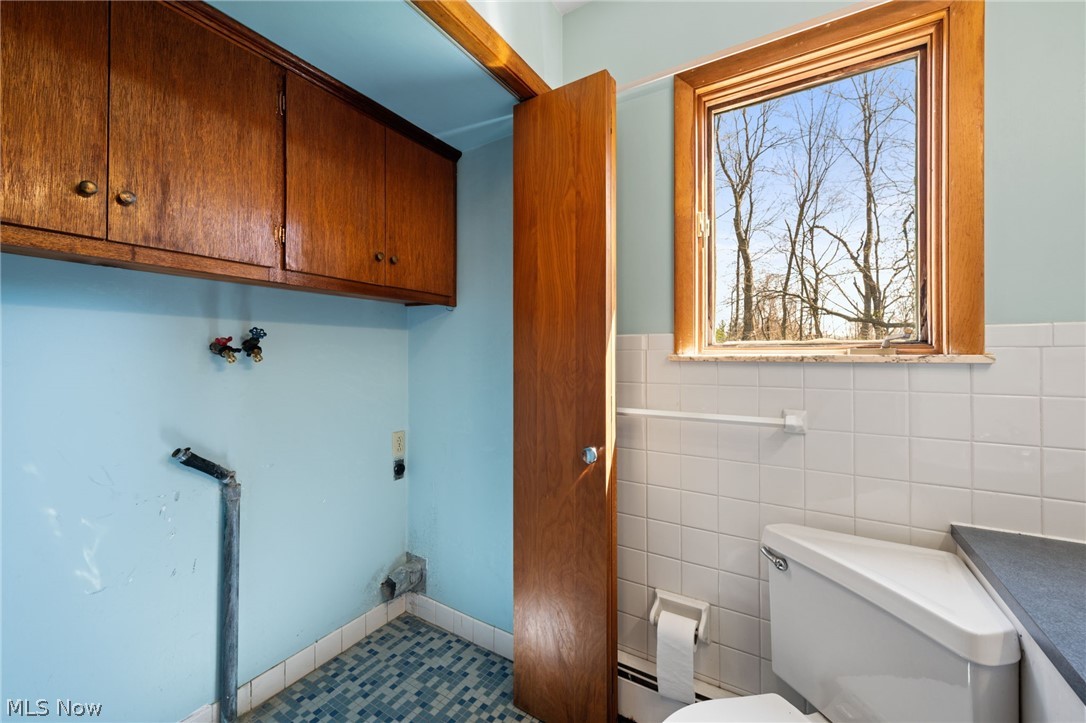 8583 Sherman Road Chesterland, OH 44026 - Photo 25 of 38 Laundry closet/2nd floor Bath