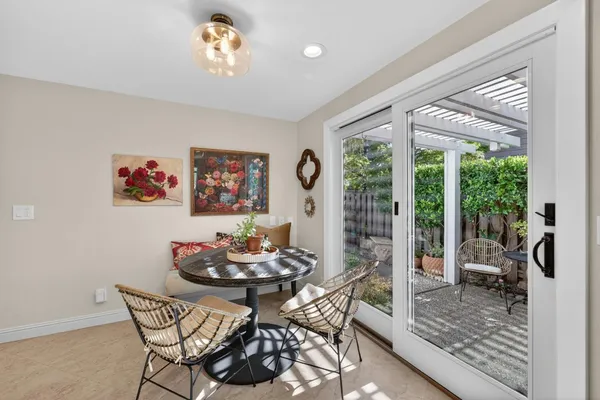 a kitchen with stainless steel appliances granite countertop a stove refrigerator and a microwave