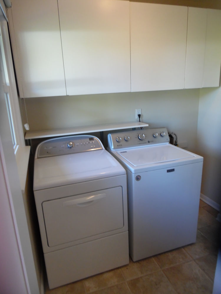 1111 10th Avenue Rochelle, IL 61068 - Photo 14 of 17 a utility room with dryer and washer