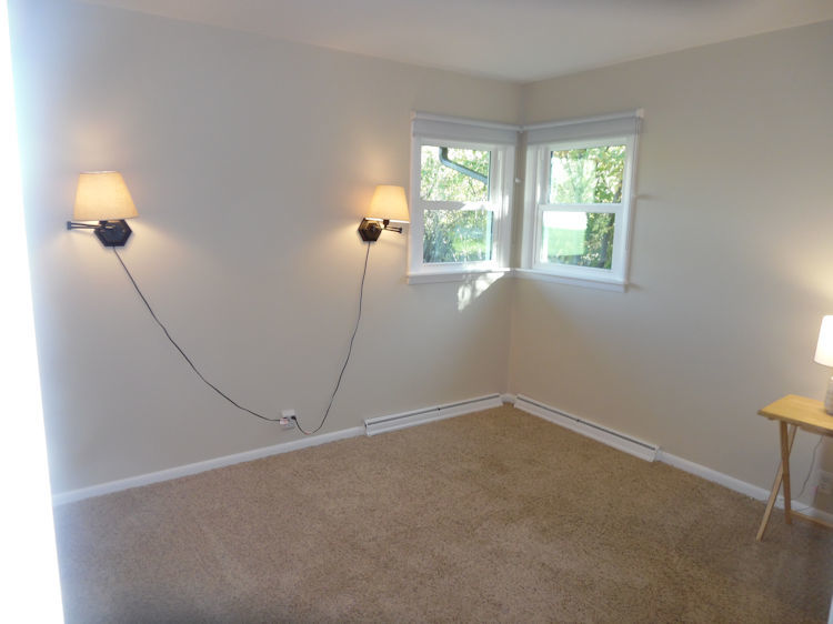 1111 10th Avenue Rochelle, IL 61068 - Photo 9 of 17 a view of an empty room with a window