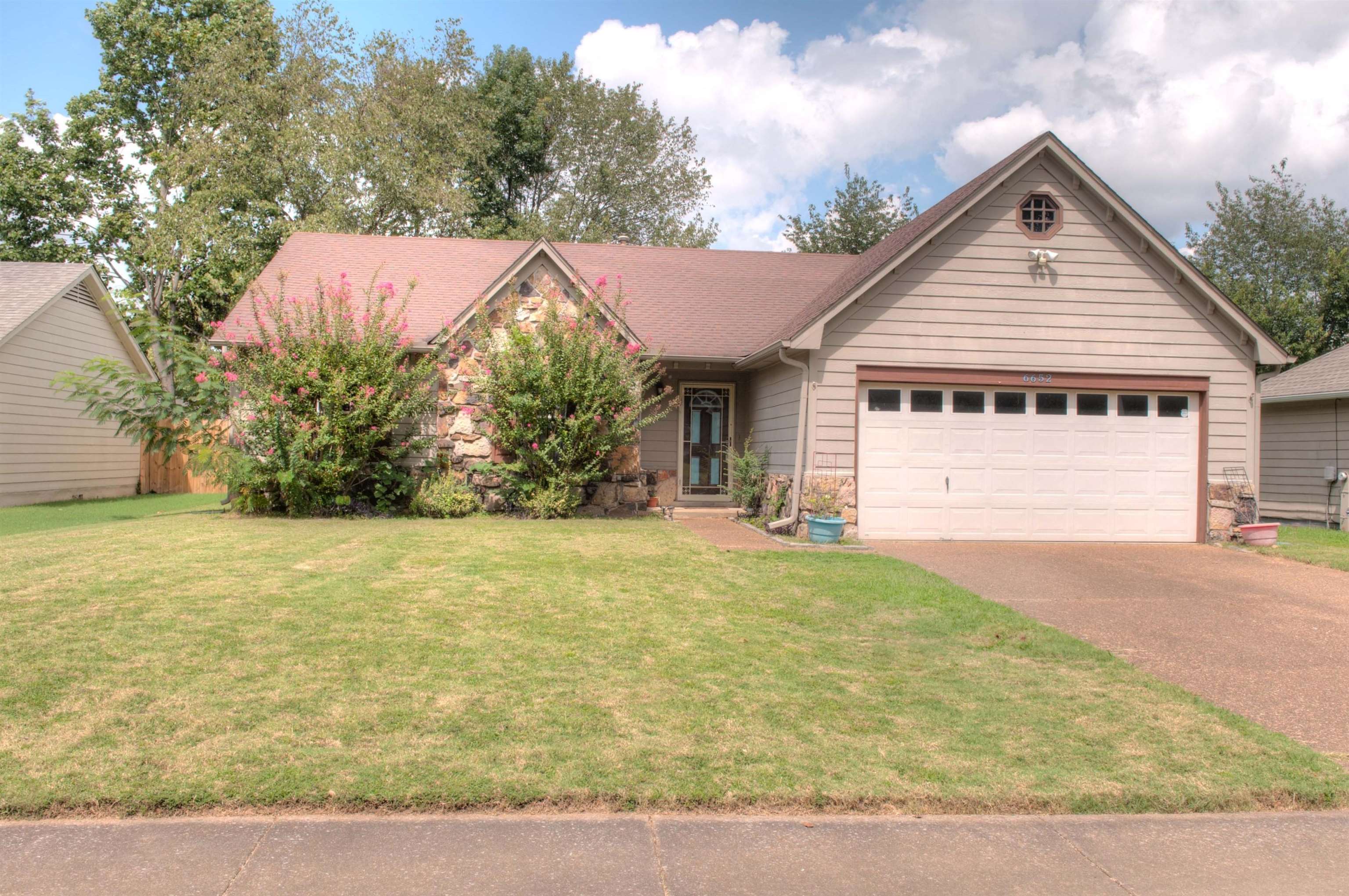 6652 Elmore Ridge Lane Memphis, TN 38134 - Photo 19 of 19 Rare, very open floorplan with views of rear grounds. Attractive Updated Flooring in the public rooms. 19 Cabinets in Kitchen w/Stainless and Refrigerator included. Priced to sell as owners hate to move but wanted to be closer to family.