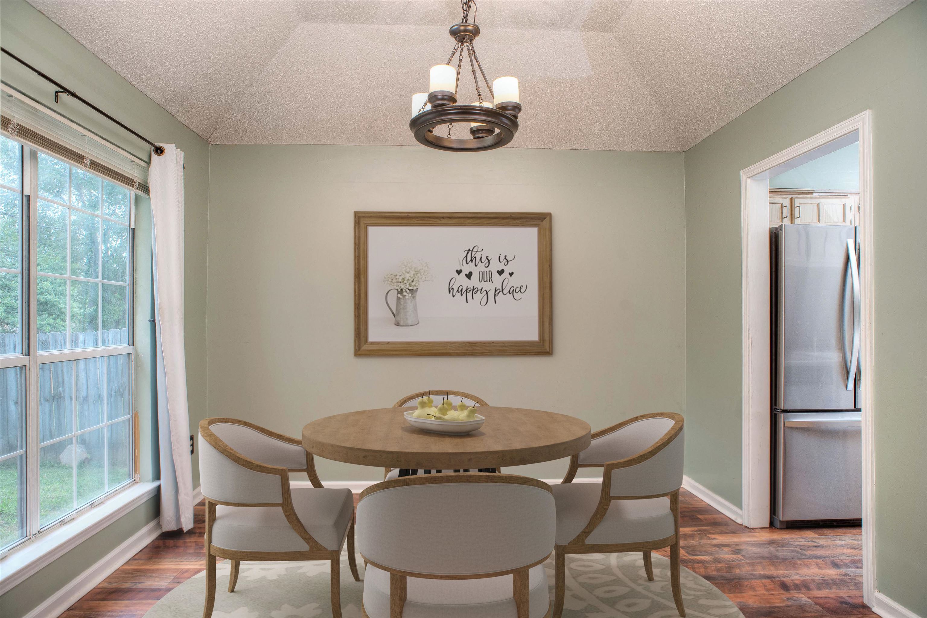 6652 Elmore Ridge Lane Memphis, TN 38134 - Photo 3 of 19 11x10 Dining Room also with Coffered Ceiling and Updated Flooring. This photo is virtually staged.