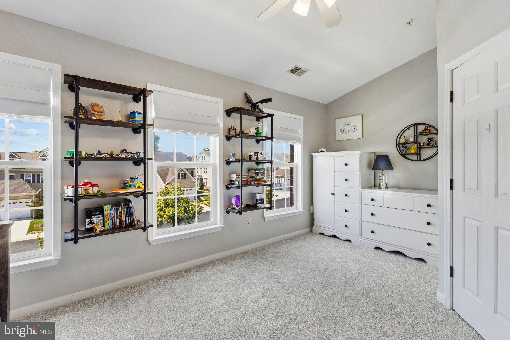 2668 Merlin Court Odenton, MD 21113 - Photo 23 of 42 a view of a livingroom with shelves