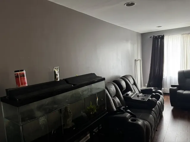 a bedroom with a bed and a mirror