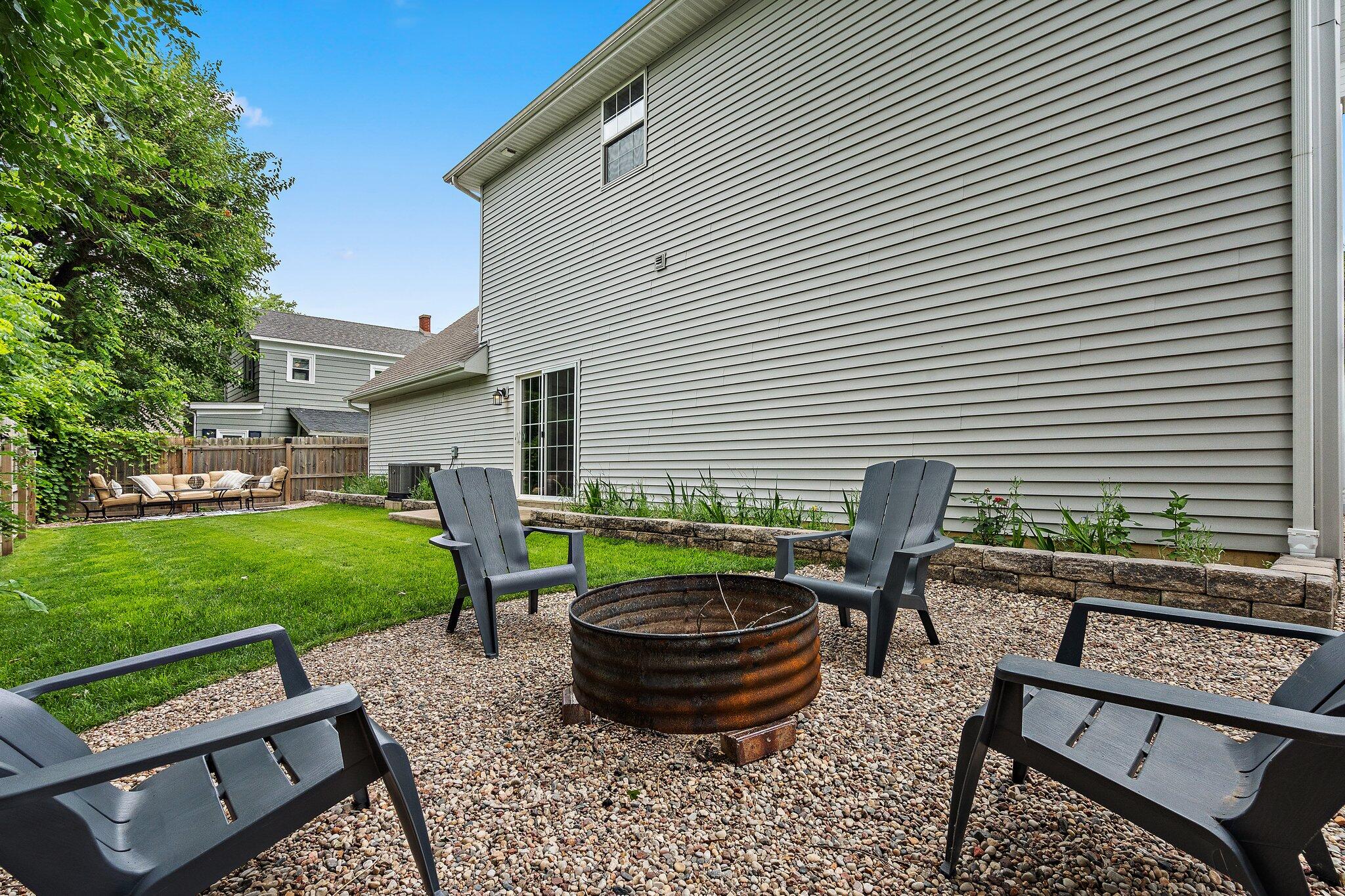 105 Madison Street Valparaiso, IN 46385 - Photo 23 of 29 a view of a backyard with furniture and garden
