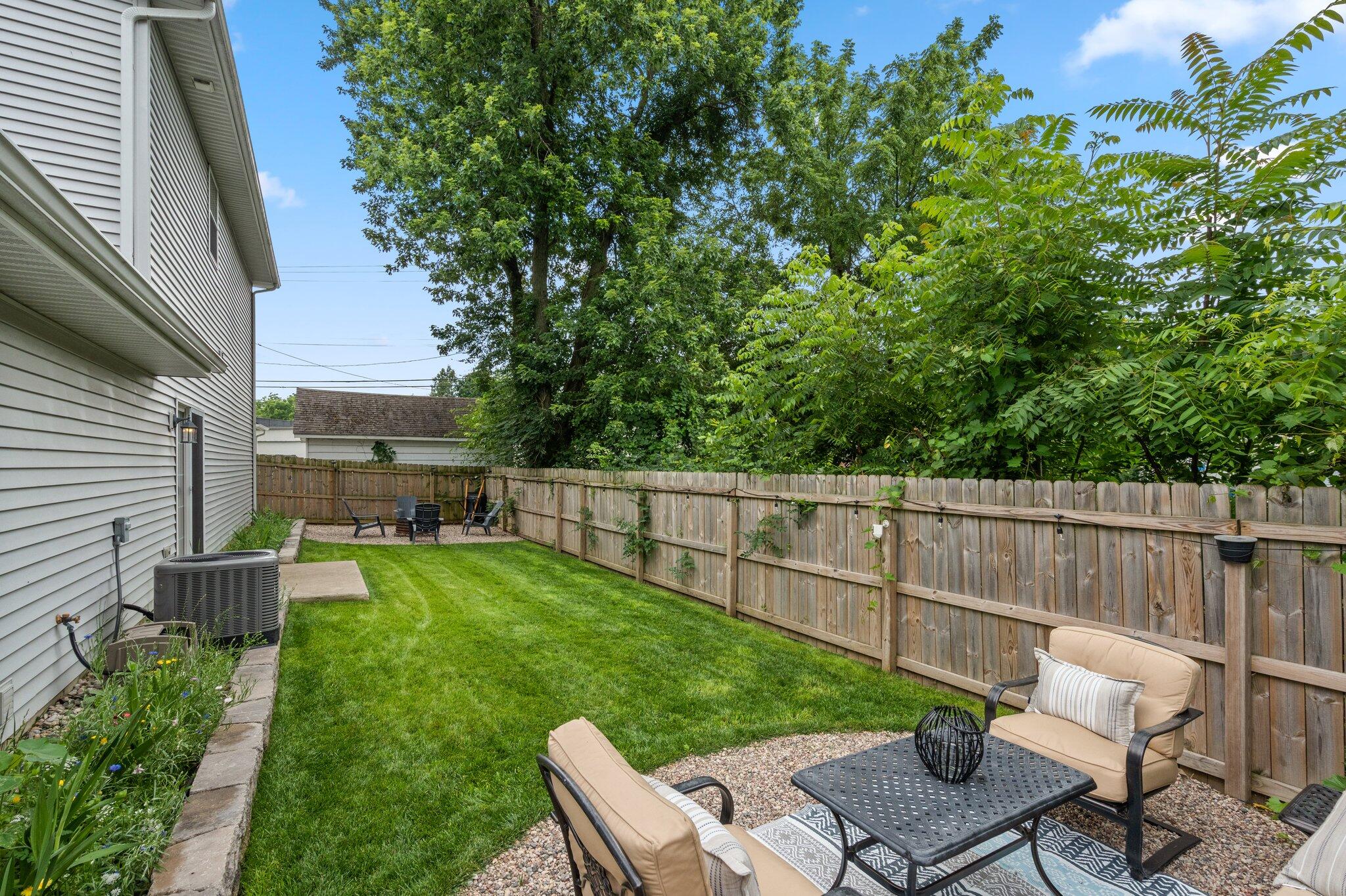 105 Madison Street Valparaiso, IN 46385 - Photo 26 of 29 a view of a backyard with sitting area and furniture