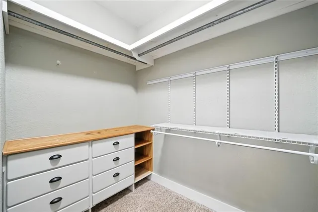 a view of an empty walk in closet