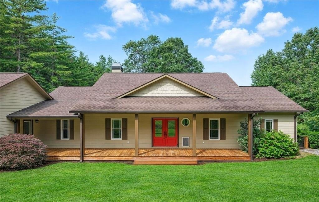 87 Dillons Lane Morganton, GA 30560 - Photo 2 of 44 a front view of a house with a yard and green space