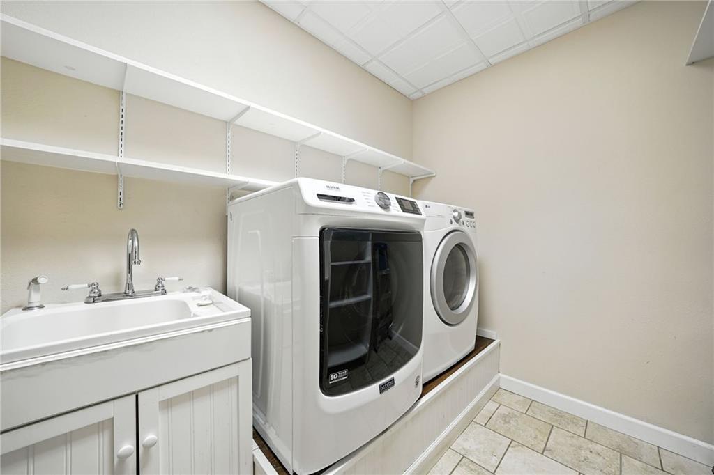 87 Dillons Lane Morganton, GA 30560 - Photo 22 of 44 a utility room with dryer and washer
