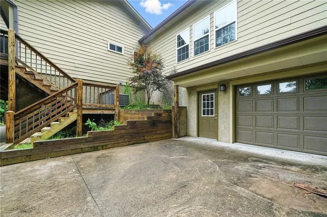 a view of a house with a garage