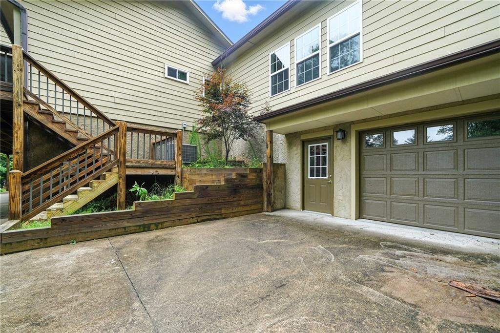 87 Dillons Lane Morganton, GA 30560 - Photo 35 of 42 a view of a house with a garage
