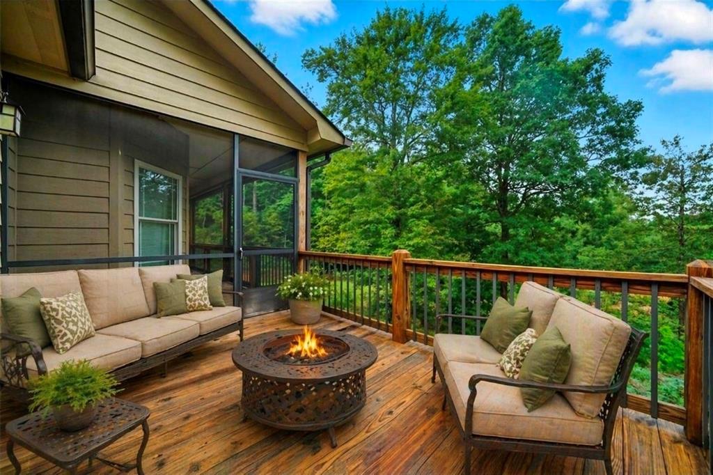 87 Dillons Lane Morganton, GA 30560 - Photo 40 of 44 a view of balcony with furniture and outdoor seating