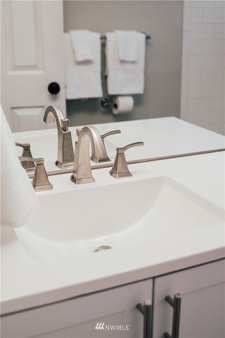 7109 Lower Ridge Road Everett, WA 98203 - Photo 14 of 22 a bathroom with a sink and a mirror