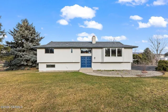 a view of a house with a swimming pool