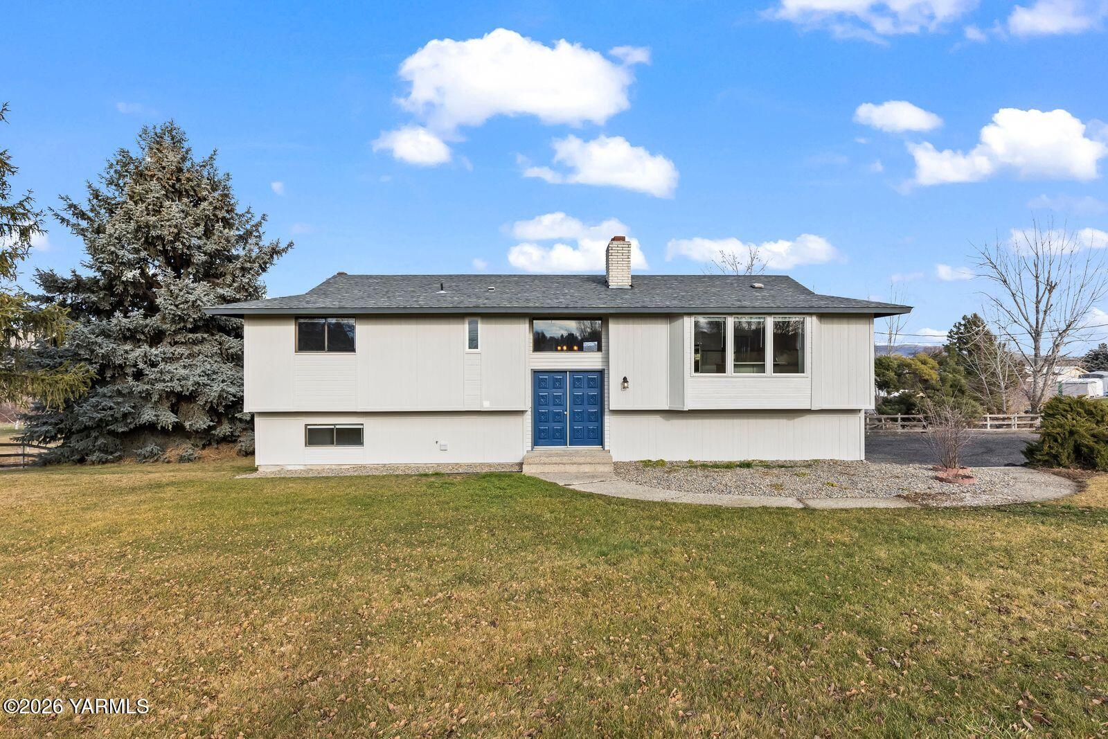 a view of a house with a swimming pool