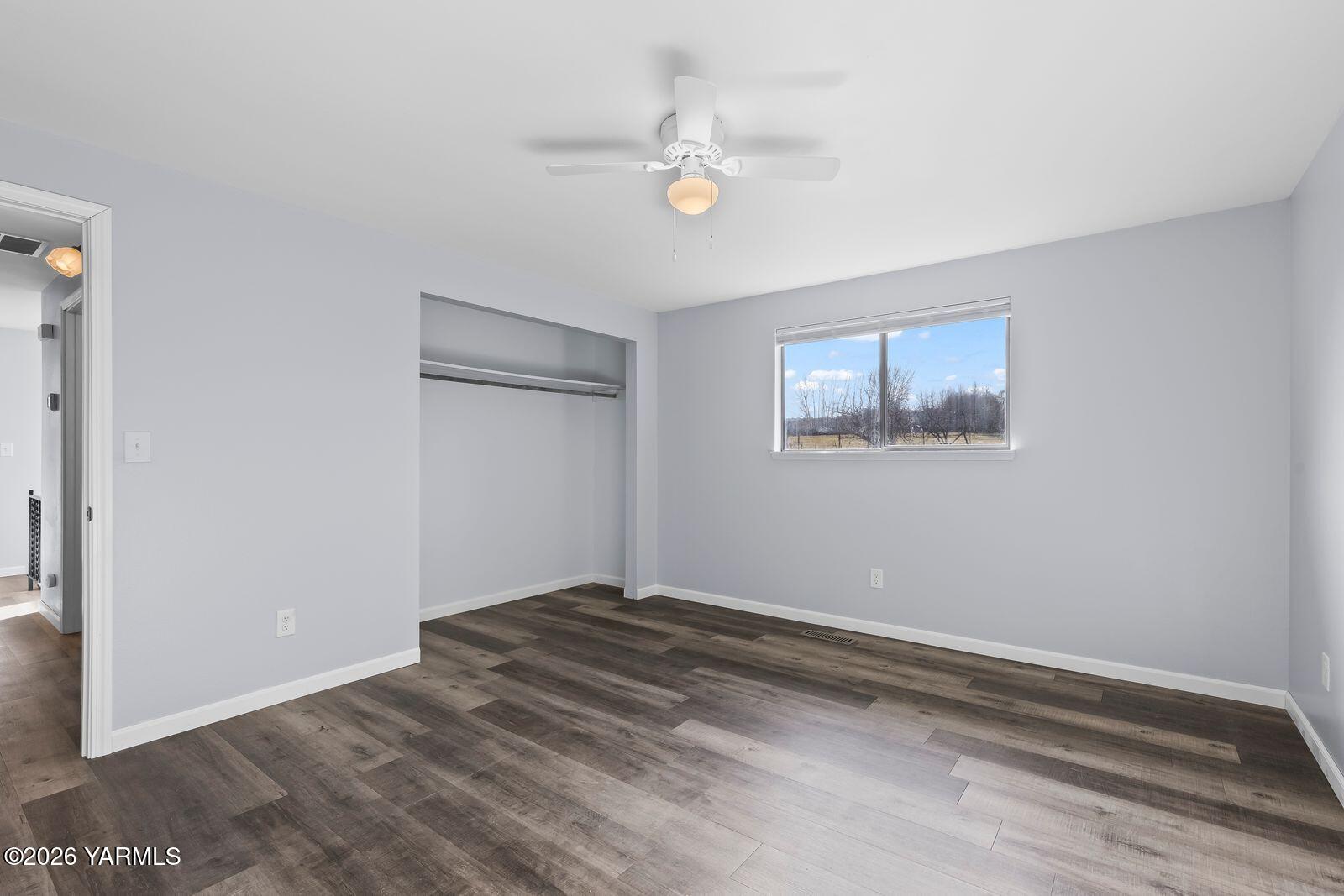 512 Taylor Road Selah, WA 98942 - Photo 21 of 36 a view of an empty room with a window