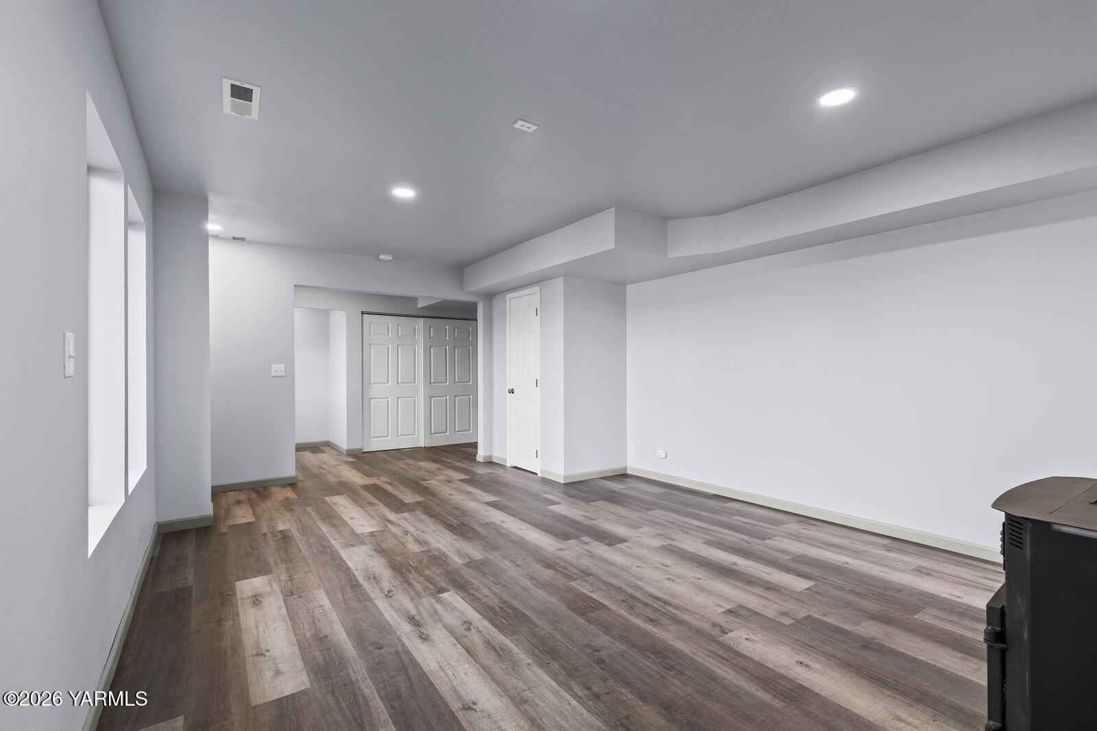 512 Taylor Road Selah, WA 98942 - Photo 24 of 36 a view of an empty room and wooden floor