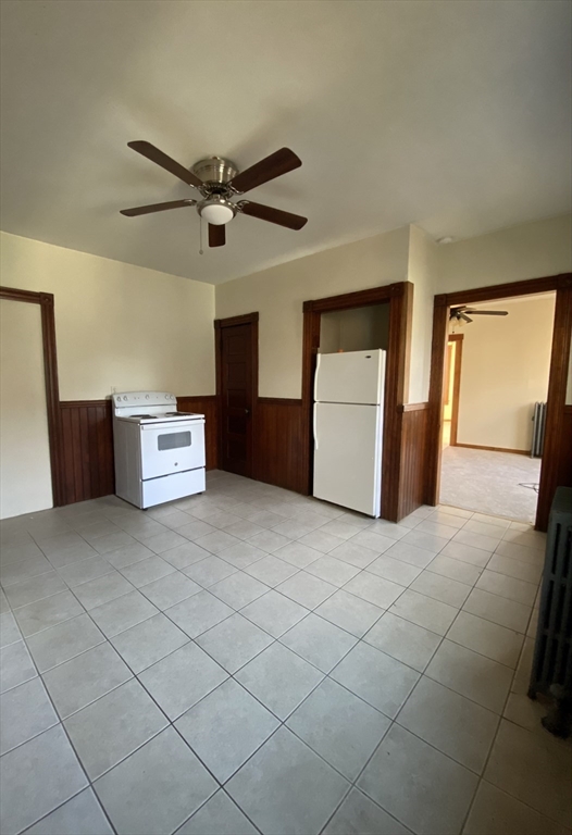 10 Lafayette Street, Unit 2 Attleboro, MA 02703 - Photo 4 of 9 a big room with closet and windows