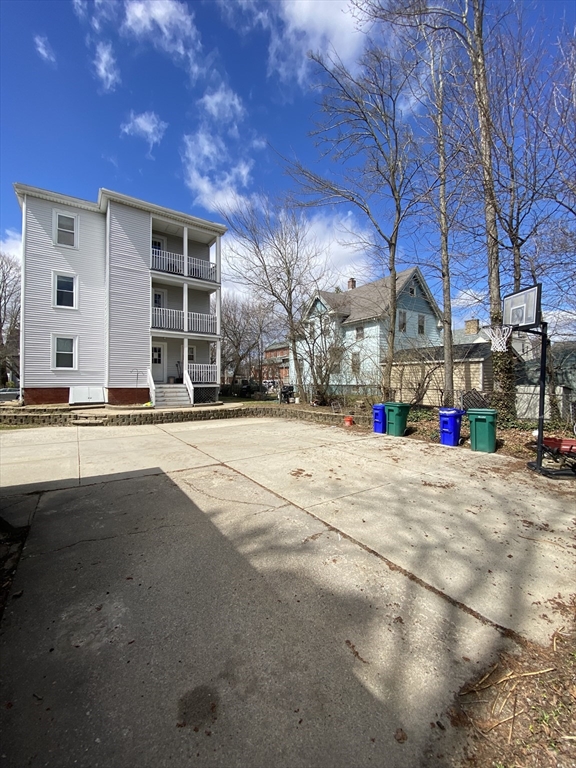 10 Lafayette Street, Unit 2 Attleboro, MA 02703 - Photo 9 of 9 a view of street with with large trees