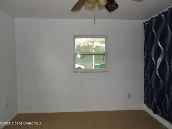 a view of a livingroom with a window