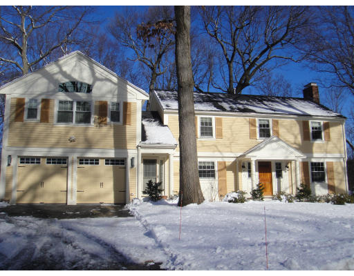 23 Bay State Road Wellesley, MA 02481 - Photo 1 of 1 a front view of a house with a yard