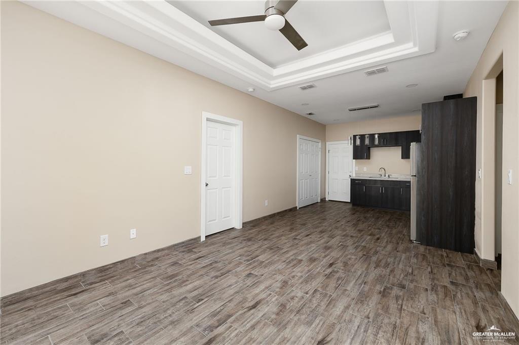 1809 Ramirez Street, Unit 2 Mission, TX 78573 - Photo 5 of 11 a view of empty room with wooden floor